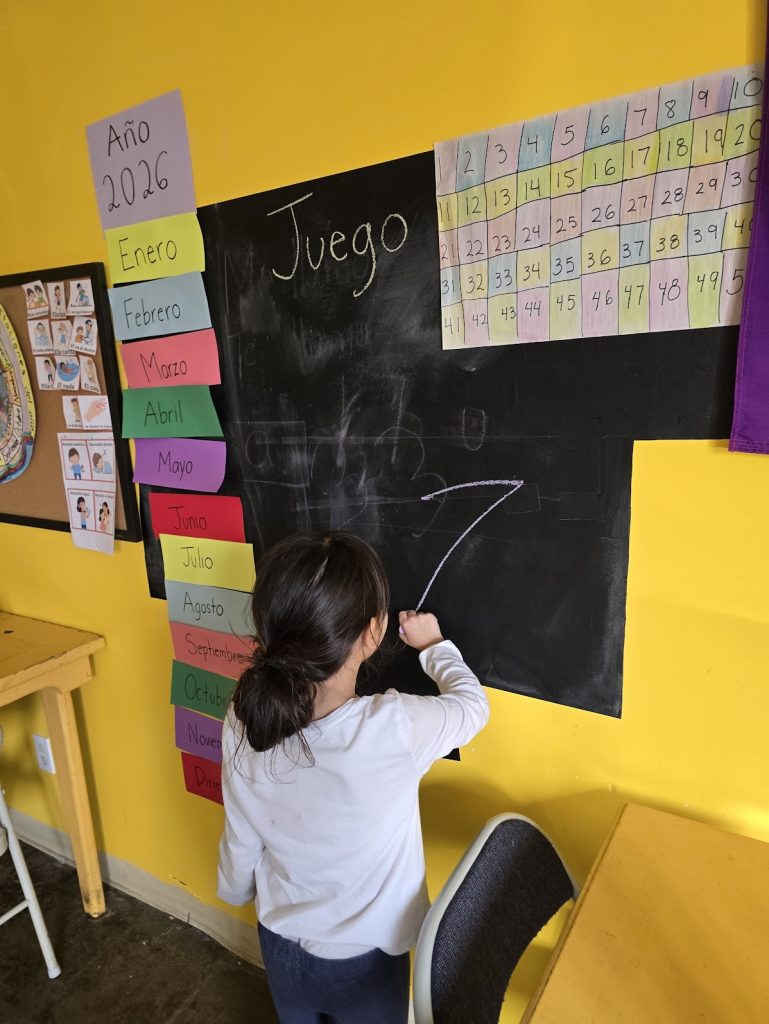 Children playing together during a Spanish language activity